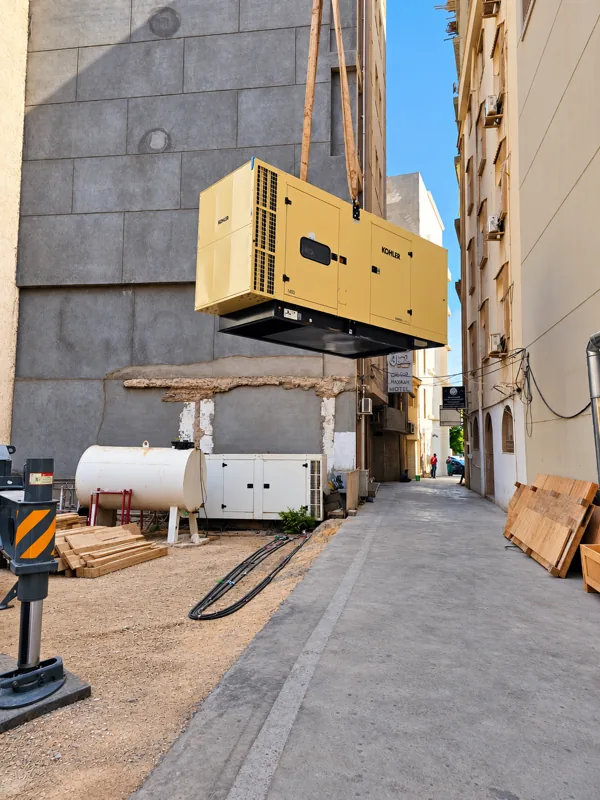 Generator lifting at an urban site